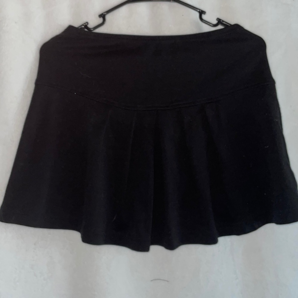 Pleated black mini skirt
